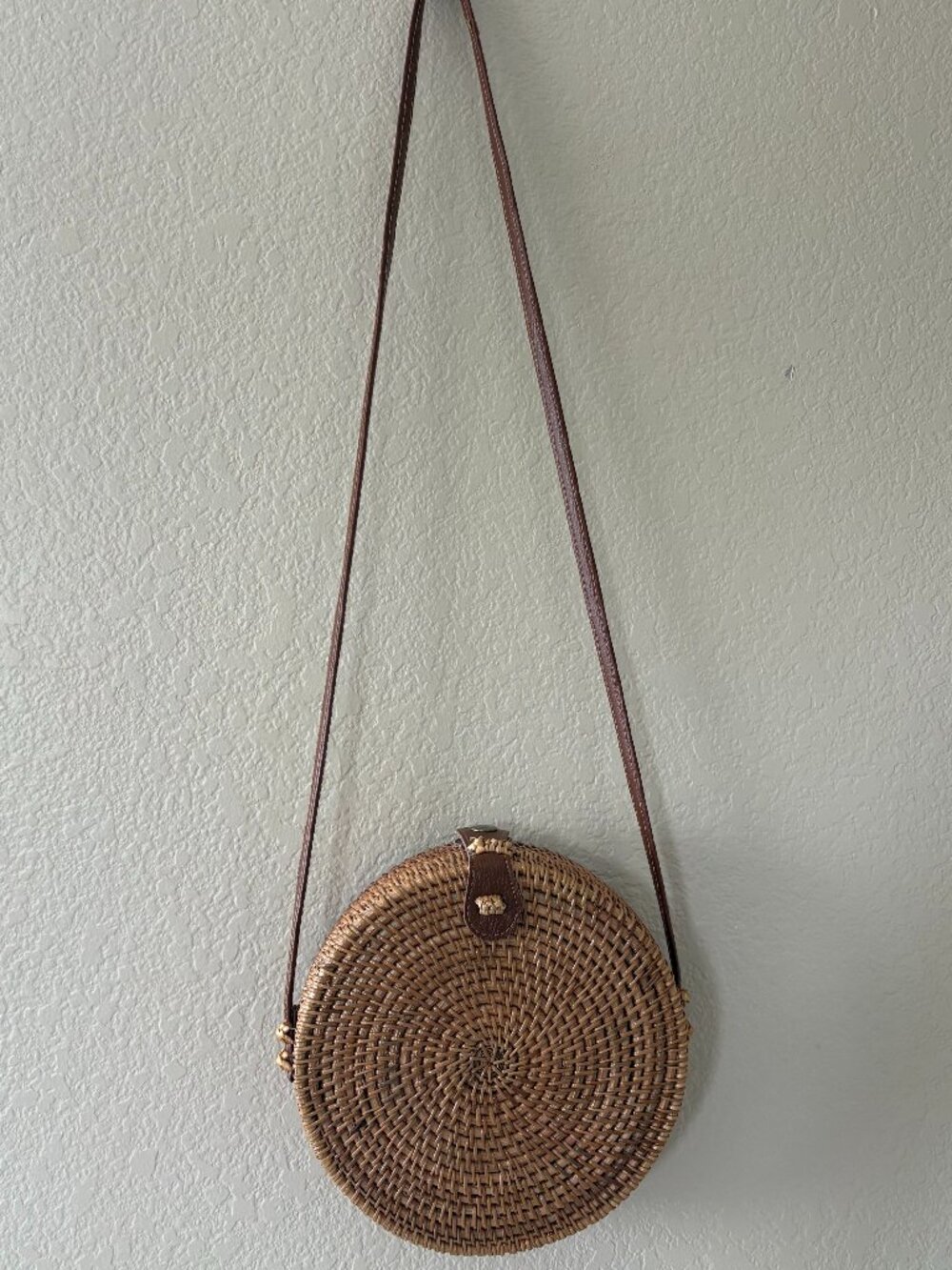 Boho round woven rattan crossbody bag with floral lining + structured silhouette
